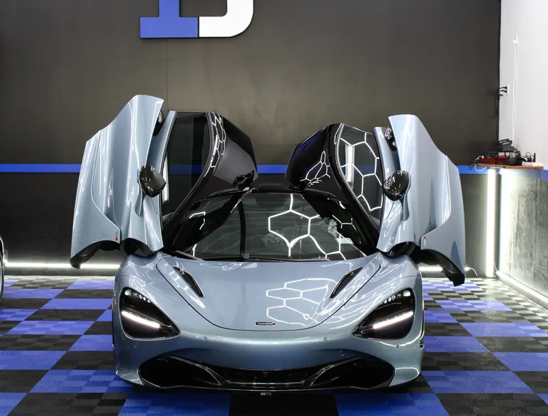 McLaren 720S in the Immaculate Detailing studio, doors raised